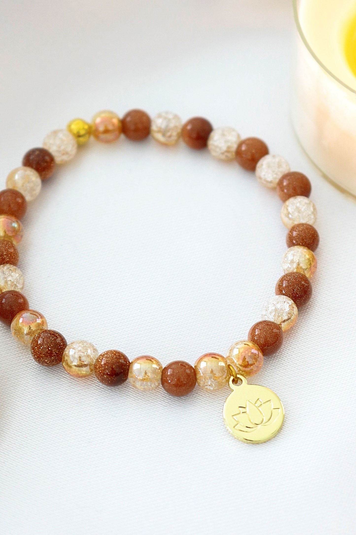 Orange Goldstone Armband – Exklusivt Handgjort Smycke för Energi och Elegans